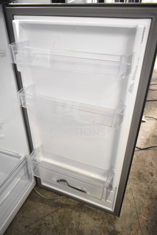 Frigidaire EFR780-T-6COM Reach-In Cooler with Freezer, interior view, three door shelves, white finish.