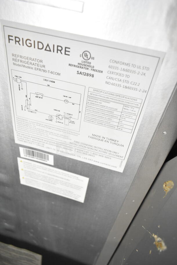 Frigidaire EFR780-T-6COM reach-in cooler with freezer, 115 volts, 1 phase, visible labels with specifications.