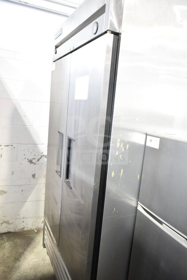 2017 True T-35 Commercial 2 Door Reach In Cooler, stainless steel, slight wear, 115 volts, 1 phase power.