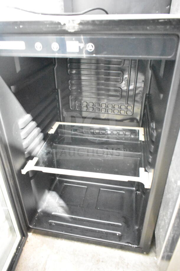 Tramontina 80901/102 mini cooler merchandiser, single door, 115 volts, 1 phase. Clean interior, black finish.