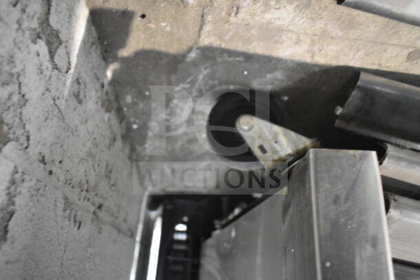 2017 True T-35-HC reach-in cooler caster view, sturdy for easy mobility, critical for commercial use.