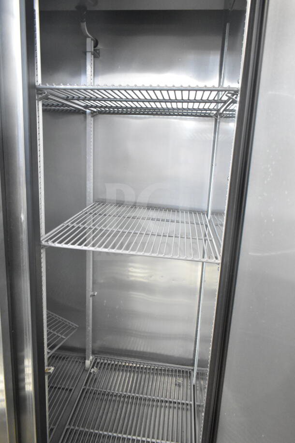 2017 True T-35-HC commercial 2-door cooler, stainless steel interior, wire shelves, on casters, 115V, 1 phase.