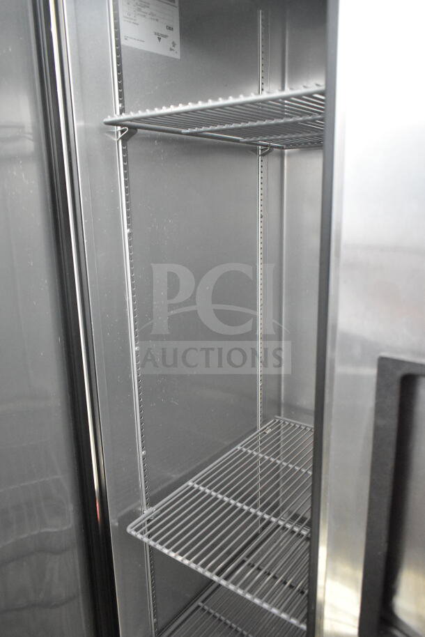 2017 True T-35-HC 2 Door Reach-In Cooler, stainless steel interior, commercial casters, 115V, visible shelving.