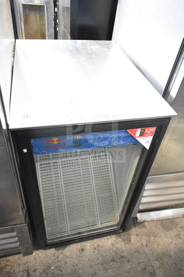 True GDM-06-LD Mini Cooler Merchandiser, 115V, with Red Bull and Monster branding, glass front, good condition.