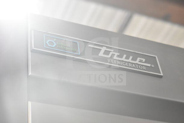 True T-35-HC Commercial Cooler, 2 doors, 2017 model, features natural refrigerant label, on commercial casters.