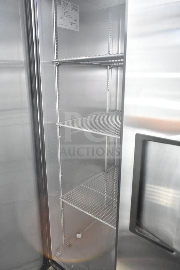 2017 True T-35-HC commercial cooler, two-door, shelves inside, mounted on casters, 115V, 1 phase, clean interior.