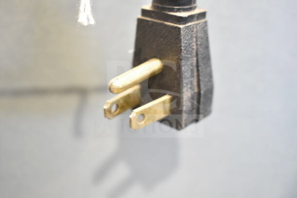 Close-up of a power plug for a 2017 True T-35-HC Commercial 2 Door Reach In Cooler, 115 Volts, 1 Phase.