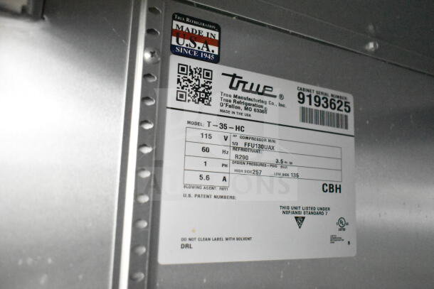 2017 True T-35-HC Commercial Cooler label, 115V, 1 Phase, showing model, voltage, refrigerant, and pressures. Made in USA.