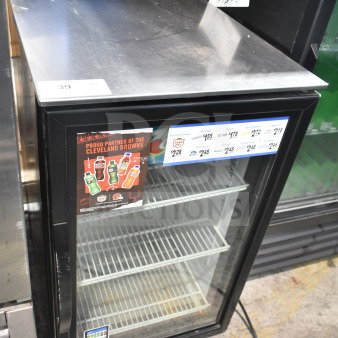 2018 True GDM-06-34-HC mini cooler merchandiser, single door, 115V, good condition, clear glass front, visible shelving.
