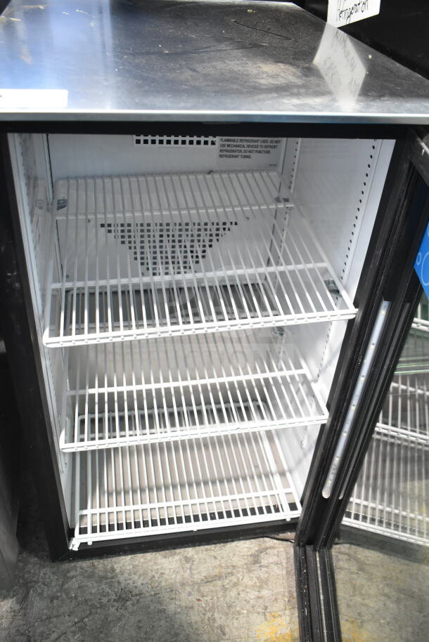 2018 True GDM-06-34-HC commercial single-door mini cooler merchandiser with metal shelves, 115 volts, 1 phase.