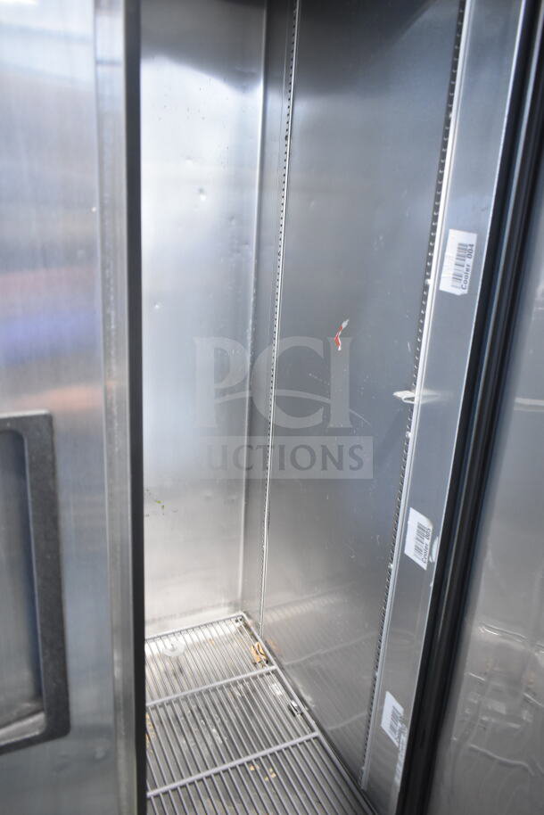 2017 True T-35-HC commercial cooler interior, stainless steel, on casters, model tag: 115V, 1 Phase, reach-in type.