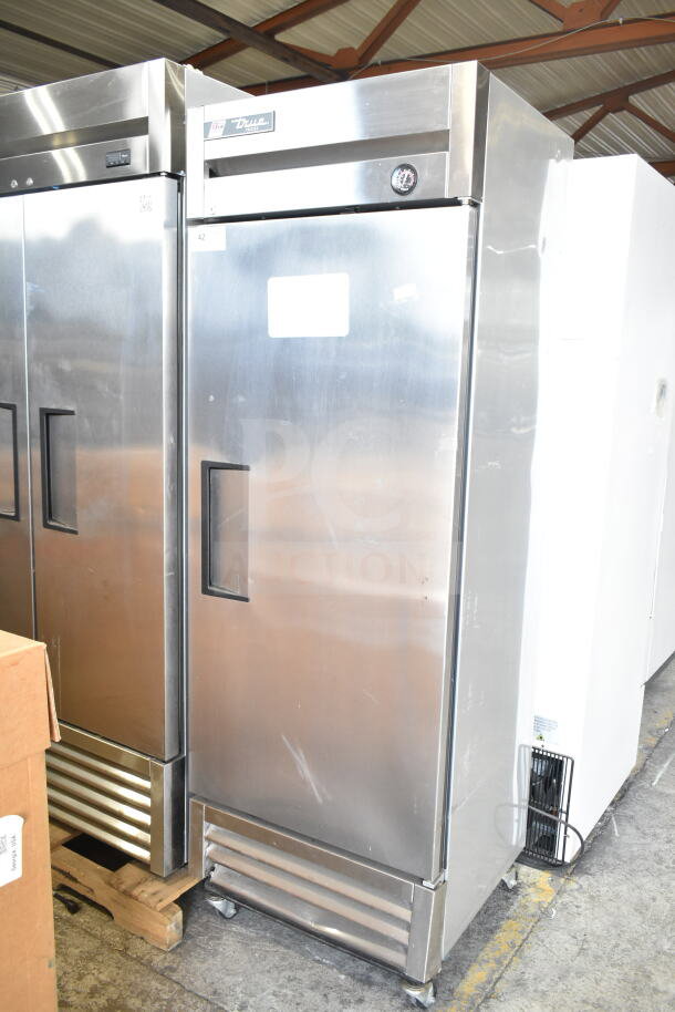 2017 True T-19F Commercial Freezer, single door, stainless steel, on casters, 115V, 1 phase, visible True branding.