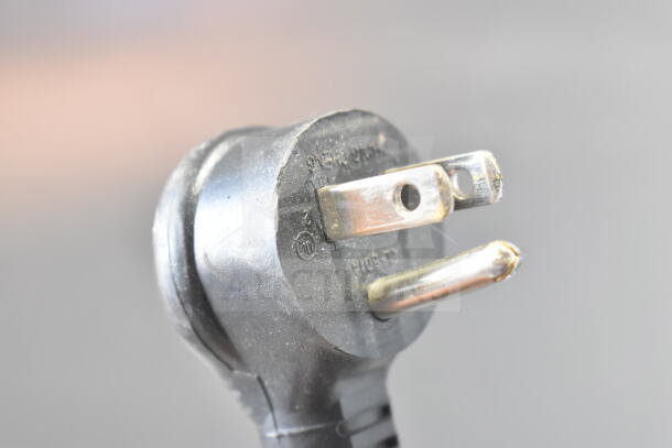 Close-up of a power plug from a 2017 True T-19F Commercial Single Door Reach In Freezer, 115 Volts, 1 Phase.