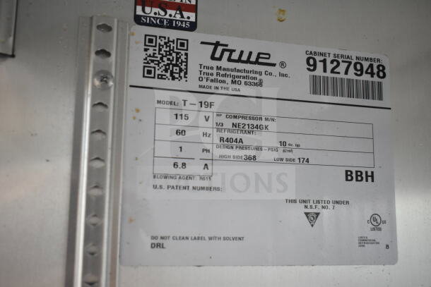 2017 True T-19F single door commercial freezer label showing model, voltage, refrigerant details, and serial number.