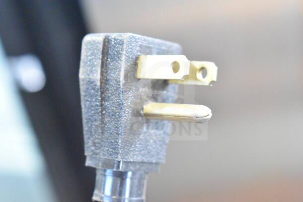 Close-up of a 115V plug for the 2022 True T-35-HC Commercial Cooler, highlighting the power connection details.