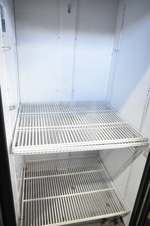 2021 True GDM-26-HC cooler merchandiser, single door, white interior shelves, 115 volts, 1 phase, excellent condition.