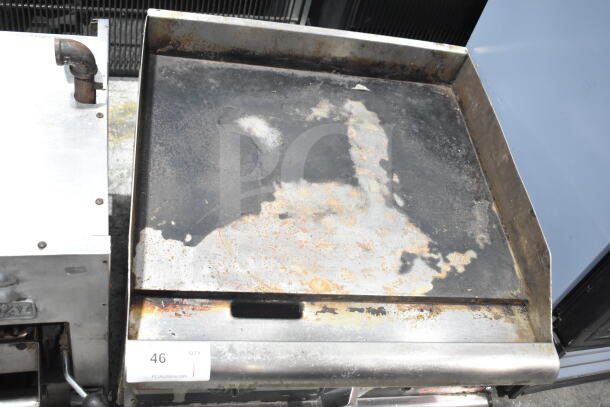 APW Wyott Champion Commercial Gas Griddle, countertop model, shows signs of wear. Auction tag visible with qty "46".