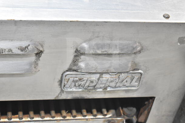 Imperial Commercial Gas Powered Cheese Melter, silver finish with visible wear, "IMPERIAL" label, grill view shown.