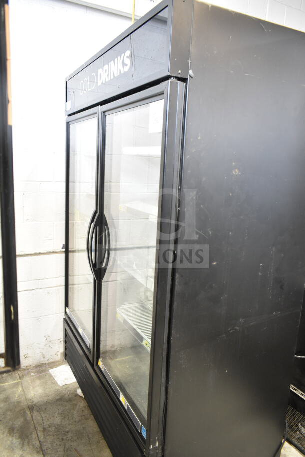 2021 True GDM-49-HC Commercial Cooler, 2 glass doors, black exterior, “Cold Drinks” label, shelves inside, 115V, 1 phase.