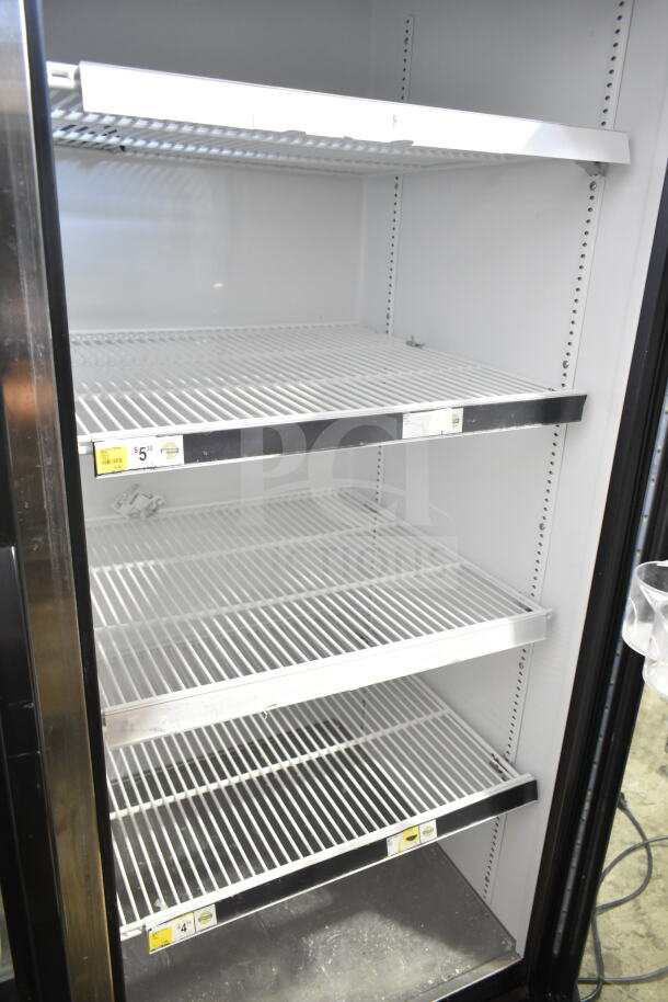 2021 True GDM-49-HC Commercial 2 Door Reach-In Cooler Merchandiser, clean interior with adjustable shelving, 115 volts, 1 phase.