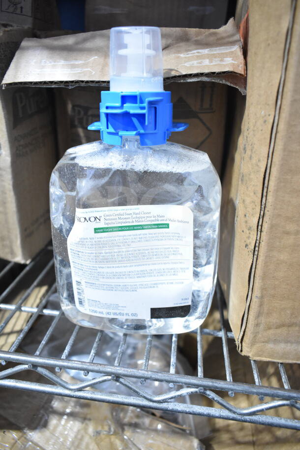 Lot of various items featuring a 1250 mL Purell hand sanitizer bottle, shown with packaging and label details.