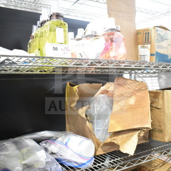 ALL ONE MONEY lot with two shelves of various items, including dry foam shampoo, encapsulation cleanser, and GoJo hand cleaner.
