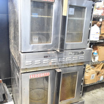 Blodgett commercial full-size convection ovens with view-through doors, thermostatic controls, on commercial casters.