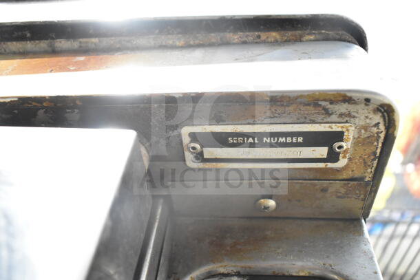 Blodgett commercial convection oven detail showing serial number label, indicating model authenticity, on a well-used surface.