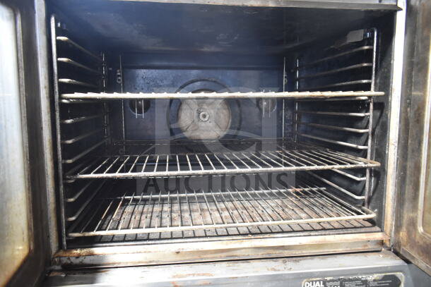 Blodgett commercial convection oven interior with racks, view-through doors, and thermostatic controls. Good condition.