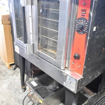 Vulcan Wells VC4GD-11D350K convection oven with view-through doors, thermostatic controls, metal legs, and commercial casters.