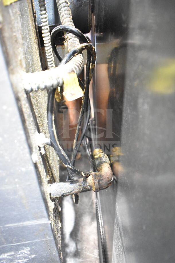 Vulcan Wells Commercial convection oven VC4GD-11D350K wiring and pipes detail; shows condition and connections.