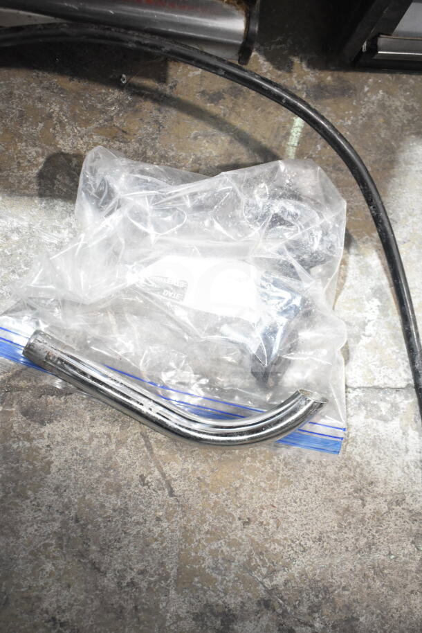 Arcobaleno APCT24 fryer accessories, including a metal pipe, in clear packaging. Used for electric countertop fryer.