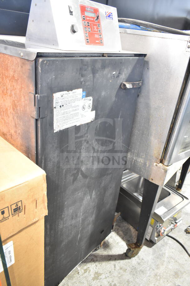 CookShack 250 Commercial Electric Smoker Cabinet, 208V, black exterior, visible control panel, signs of wear.