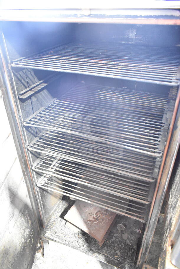 CookShack 250 Commercial Electric Smoker Cabinet with multiple racks. Model 250, 208 Volts. Used condition.