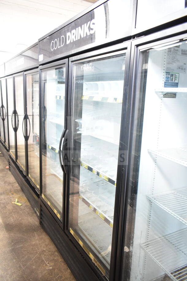 2017 True GDM-49-HC commercial 2-door cooler merchandiser, black frame, glass doors, shelves, "Cold Drinks" signage, 115V, 1-phase.
