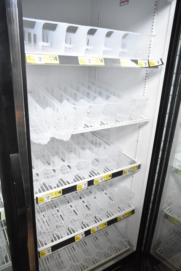 2017 True GDM-49-HC commercial cooler, two glass doors, white interior, adjustable shelves, 115V, 1 phase.