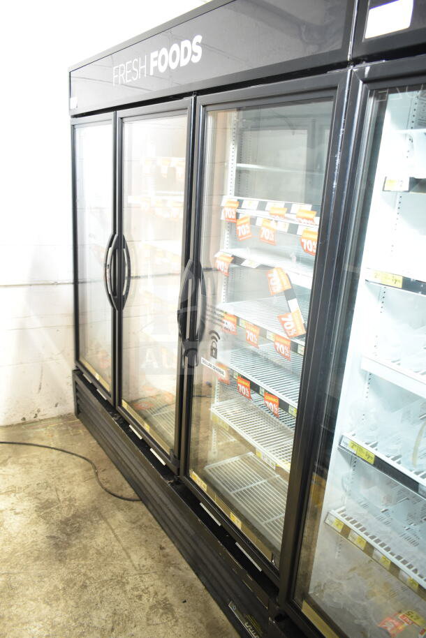 2017 True GDM-72-HC 3 Door Commercial Cooler, 115V, Fresh Foods label, clear glass doors, metal shelves, good condition.