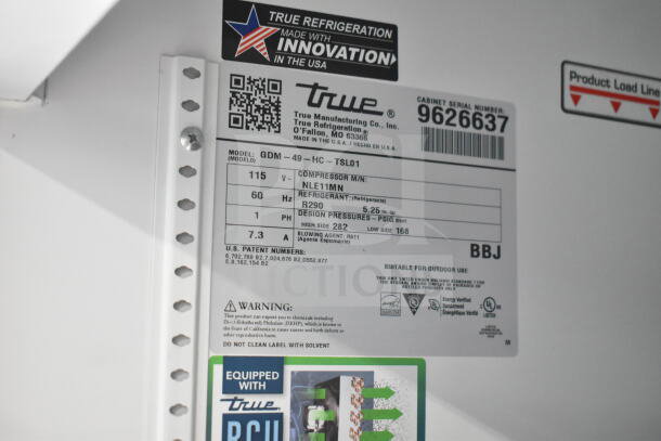 2019 True GDM-49-HC cooler tag detailing model, voltage, refrigerant, and operating specifications.