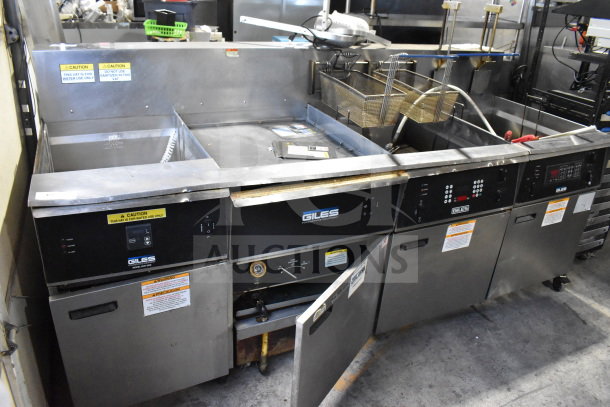 Giles EOF-24 Stainless Steel 3 Bay Fryer with Dumping Station, 480V, 3 Phase, features control panels and caution labels.