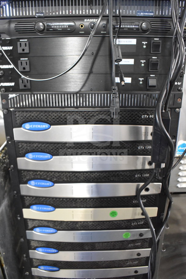 15-unit AV rack with 10 Crown CTs 1200 amplifiers, 3 Furman M-8x voltage regulators, and a Samson unit on commercial casters.