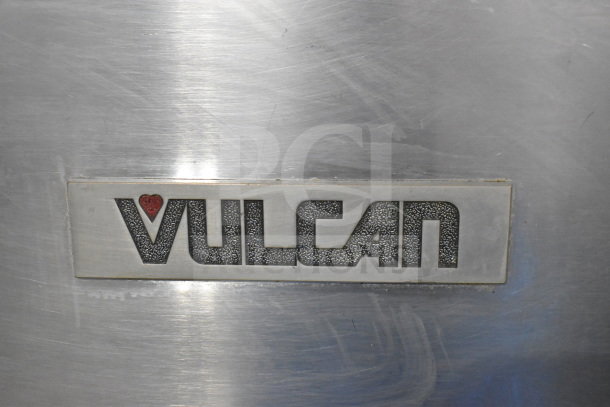 Vulcan C24EO3 steam cabinet badge on stainless steel, indicating commercial quality.