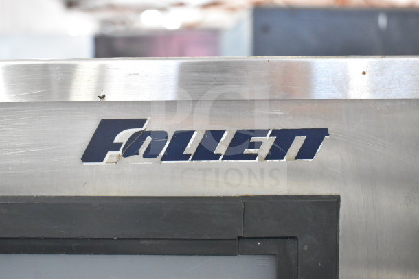 Follett SG700S Commercial Ice Bin, stainless steel, visible Follett logo, durable design, used condition. Model: SG700S.