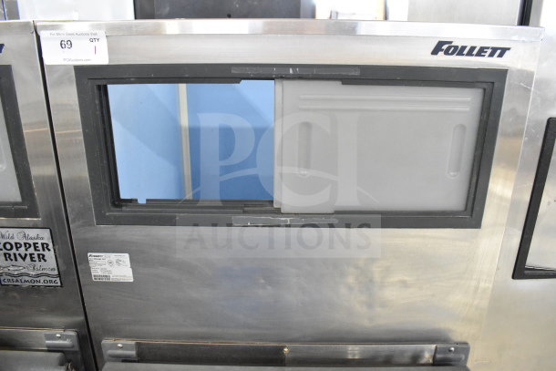 Follett SG700S-30 commercial ice bin, stainless steel, sliding door, visible brand label, good condition.