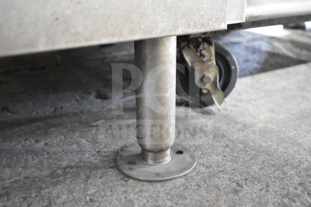Follett SG700S-30 Commercial Ice Bin leg and wheel detail, showing robust construction.