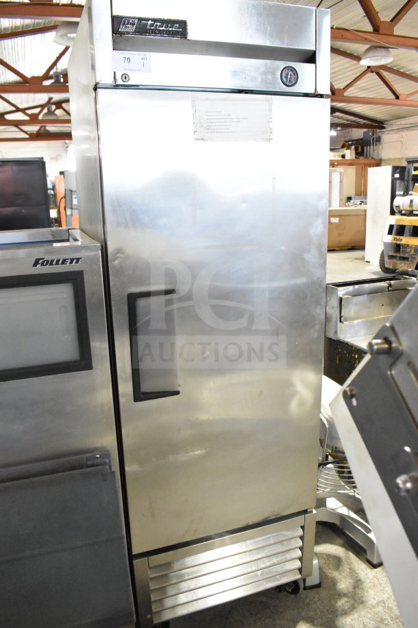 True T-23 commercial single door reach-in cooler on casters, stainless steel, 115 volts, good condition, labeled True.