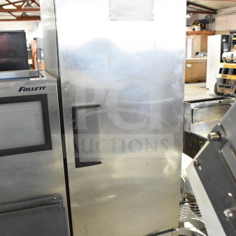 True T-23 commercial single door reach-in cooler on casters, stainless steel, 115 volts, good condition, labeled True.