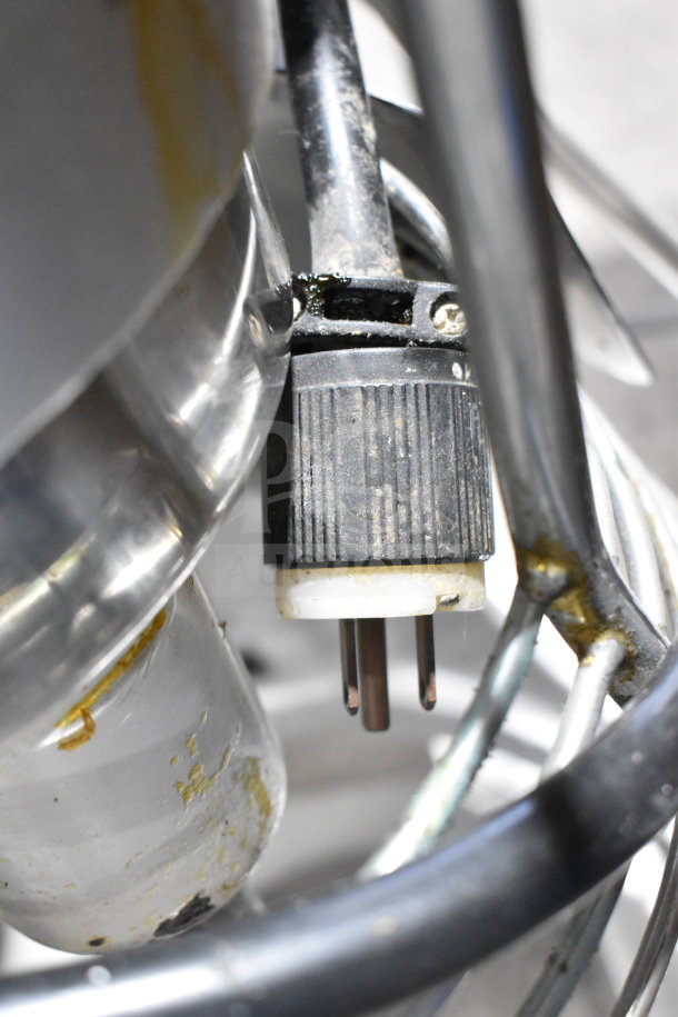 Fleetwood M20A 20 Quart Planetary Dough Mixer plug detail; 120V, 1-phase. Visible steel components and electrical connection.