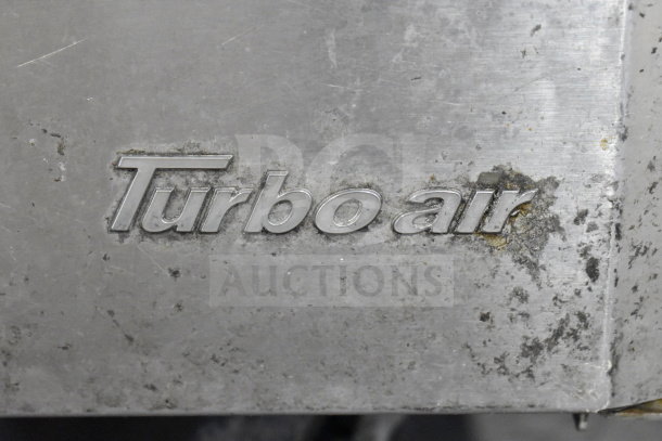 Turbo Air MUR-28-N cooler, stainless steel with visible wear, branded logo shown. 115V, 1 phase, on casters.
