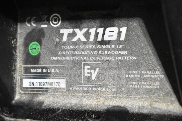 Electro Voice EV TX1181 subwoofer label showing model details, including 18" direct-radiating, 500 watts, 8 ohms, and U.S. made.