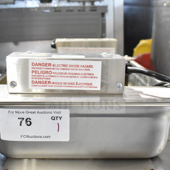 Birmingham 815234X2 evaporator condensate pan, 208 volts, features electric shock hazard warning label, auction ID tag visible.